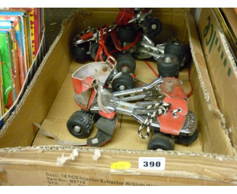Two pairs of child's vintage roller skates