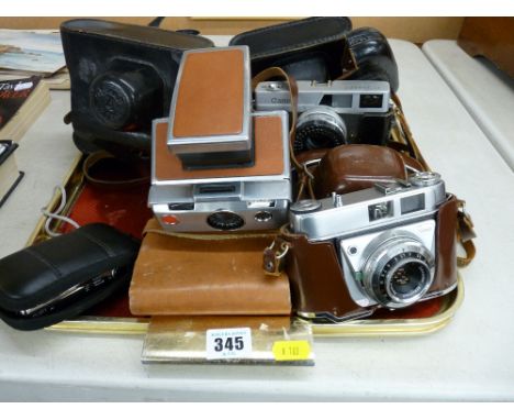 Vintage SLR cameras to include a Kodak Retinette, two Zorki-4, Zorki-4K, Canon Canonette, Polaroid Lad camera with original c
