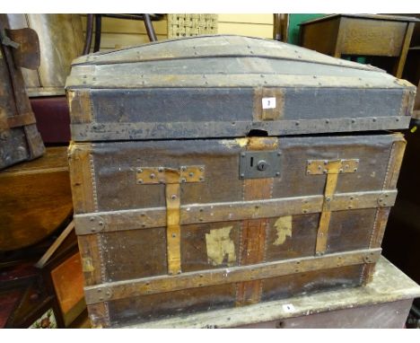 Wooden banded dome topped travel trunk