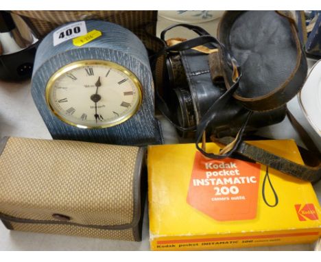 Cased pair of Hezzanith racing binoculars, modern mantel clock and three vintage cameras