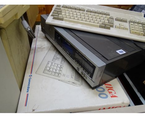 Sanyo Betamax video recorder and a boxed Commodore Amiga 500 computer E/T
