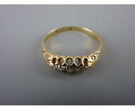 Lady's eighteen carat gold dress ring with five small diamonds, 2.6 grms