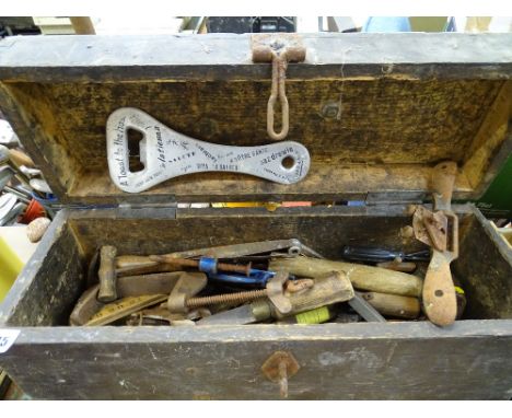 Vintage wooden toolbox containing quantity of hand tools including spoke shave etc