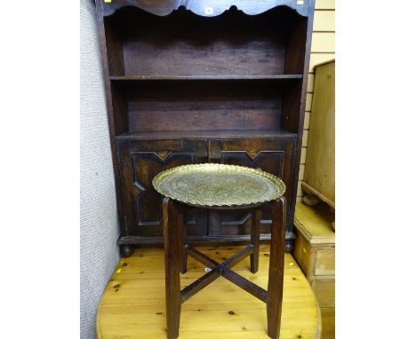 Two shelf bookcase with lower twin doors along with a small Benares brass occasional table