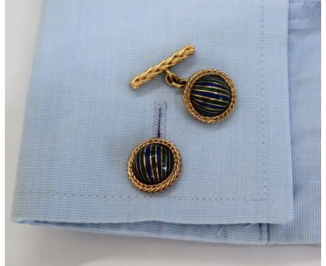 A pair of Boucheron of Paris yellow metal cufflinks of domed form with green and blue striped enamel decoration and woven bar