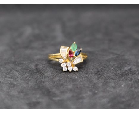 An 18ct gold diamond, ruby, sapphire and emerald dress ring, of floral design, size M, approximately 3 grams