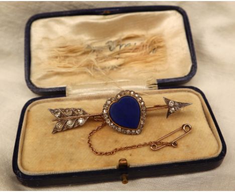 A Victorian diamond and heart shaped lapis lazuli set arrow bar brooch, set with round old cut diamonds to a white metal sett