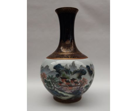 A Chinese porcelain bottle vase decorated with landscape and river scenes, seal mark to the base, 42cm high  CONDITION REPORT