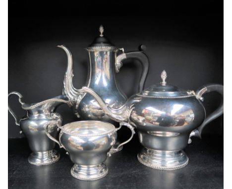 An Elizabeth II silver four piece tea set, with a baluster hot water jug, teapot, cream jug and twin handled sugar basin, Bir