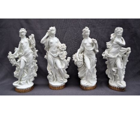 A set of four large Royal Worcester figures of the Seasons, modelled by Sir Arnold Machin (1911-99), from a limited edition s