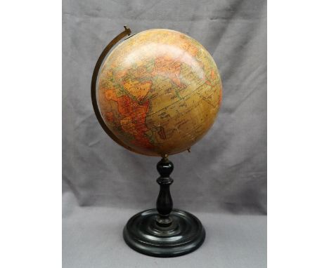 A "Geographia" 10 inch Terrestrial Globe, on a turned ebonised base, 47cm high 