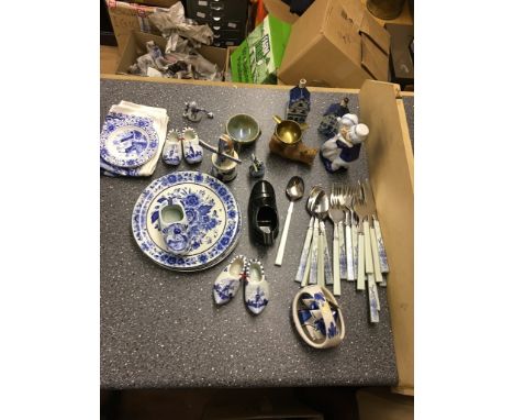 A collection of Delft ornaments, Black Forest bear ashtray and one other item including flatware