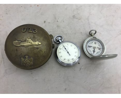 A Military stopwatch and compass