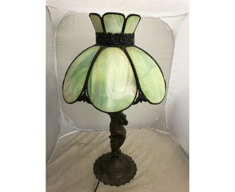 A bronzed Art Nouveau-style lamp