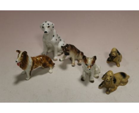 SIX SMALL CERAMIC DOG FIGURES