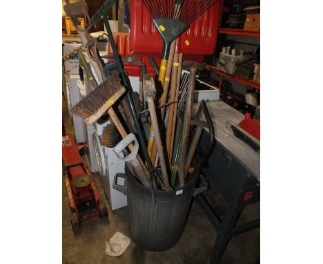 A BIN FULL OF GARDEN TOOLS