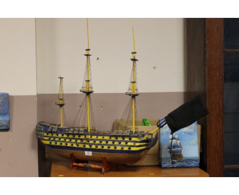 A MODEL HMS VICTORY TOGETHER WITH ASSOCIATED PICTURES AND PRINTS