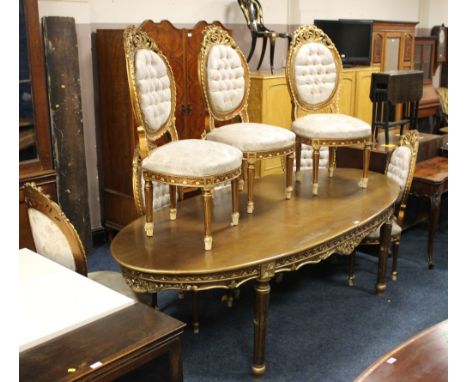 A SET OF EIGHT LOUIS XV STYLE GILT WOOD CHAIRS, with upholstered seats and backs, raised on turned fluted supports, together 