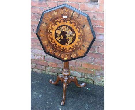 A VICTORIAN INLAID TILT TOP TABLE, THE OCTAGONAL TOP WITH FOLIATE DECORATION, RAISED ON A FLUTED COLUMN AND TRIPOD SUPPORT