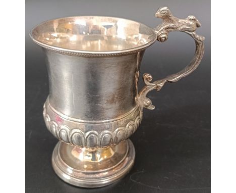 A silver christening mug, the handle with an animal, marks indistinct, 3.4 ozt, 10 cm high