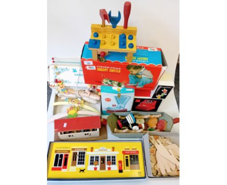 Collection of vintage toys to include Fisher Price Snoopy Sniffer, Hand painted mobile, Wooden tool bench with tools, jigsaws