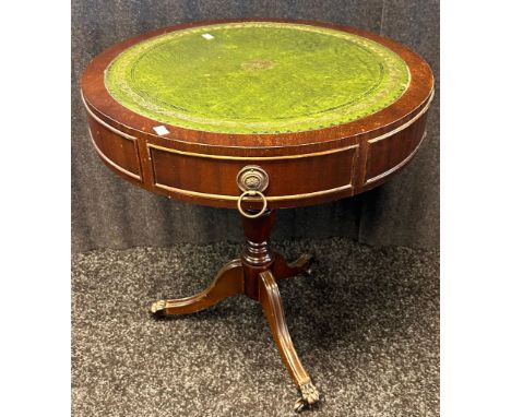 Reproduction circular side table, leather top above a frieze drawer raised on a tripod base. [ 56.5cm x 51cm] 