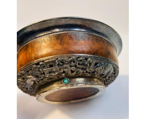 Tibetan Mongolian Burwood and white metal eating bowl, 20th century, together with a Siamh silver elephant lighter 