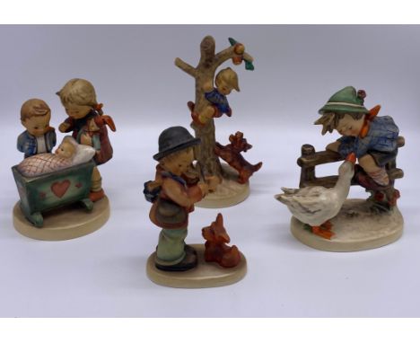 Four 1940/1950s West German Goebel Hummel figures 