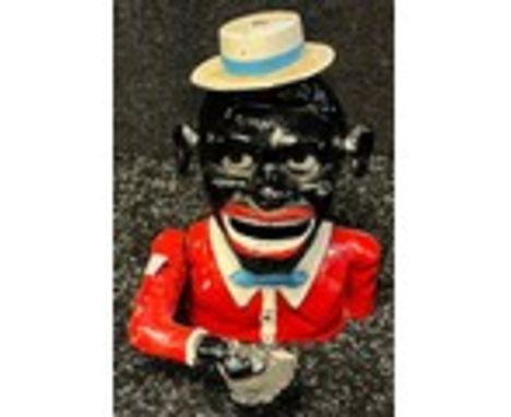 Vintage cast iron money box Notice from the the-saleroom.com: These items are listed on the basis they are illustrative of a 