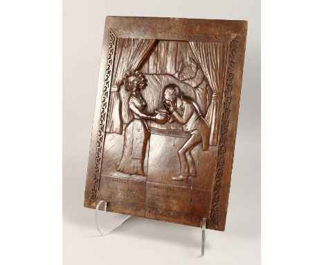 A GOOD CARVED WOOD PANEL 16ins x 11.5ins.