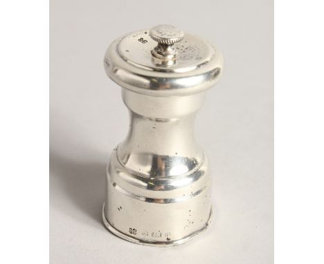 A SILVER BALLISTER SHAPED PEPPER GRINDER, Birmingham 1900, 3ins high.