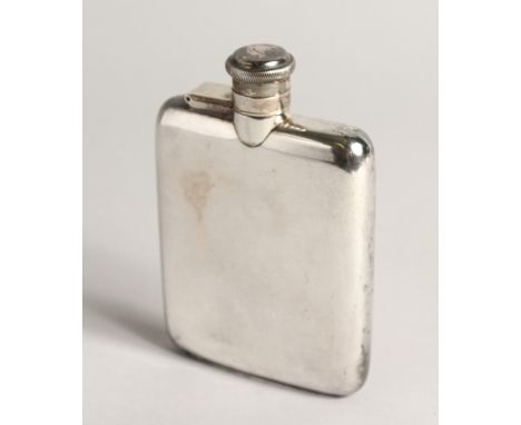 A SILVER HIP FLASK with hinged, captive top Sheffield 1941 5ozs, 5ins high.