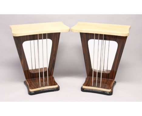 A PAIR OF UNUSUAL CREAM LACQUERED AND ROSEWOOD CONSOLE TABLES, the tops supported by three metal rods, with mirrored backs on