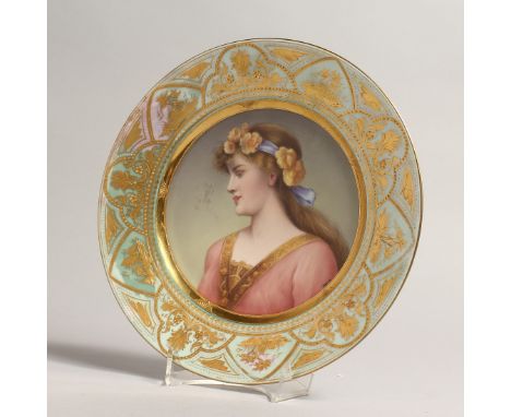 A VERY GOOD 19TH CENTURY VIENNA CIRCULAR PORTRAIT PLATE with superb gilding and portrait of a young girl `LUGEND'. 9ins diame