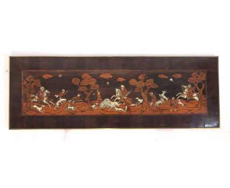 An 18th century Italian marquetry panel depicting a hunting scene, composed from sand shaded cedar wood and engraved ivory se