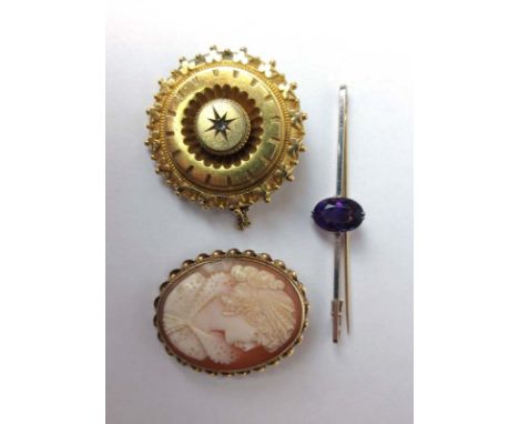 A 9ct gold carved shell cameo brooch together with a Victorian yellow metal and diamond circular brooch and a 9ct gold amethy