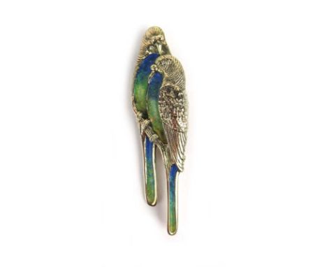A 9ct gold and enamel brooch modelled as two birds. Approx weight 8.7g