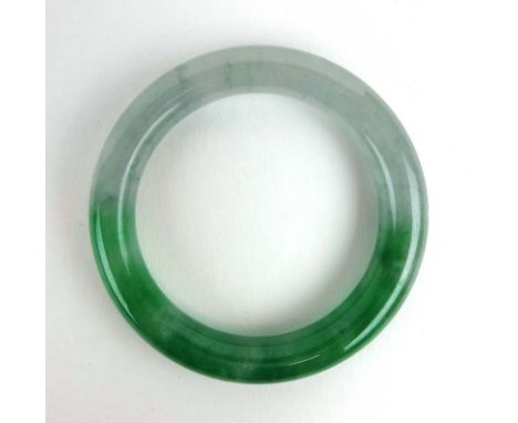 A pale green jade bangle, internal d. 5.5 cm