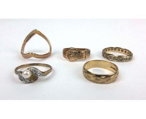 A group of five 9ct gold rings to include spinel eternity ring, wishbone ring, buckle ring etc. Approx weight 10.9g CONDITION