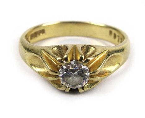 An 18ct yellow gold diamond solitaire ring, the approximately 0.5ct stone in a gypsy style setting. Approx weight 6.2g CONDIT