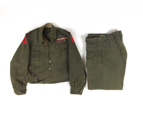 A WWII Royal artillery battledress and trousers belonging to Major R.F Hughes, R.A. Complete with Royal artillery shoulder ti