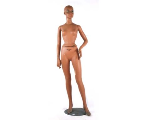 A mid 20th century female mannequin by Fery-Boudrot on metal base, h. 168 cm CONDITION REPORT: Losses and cracks to paint wor