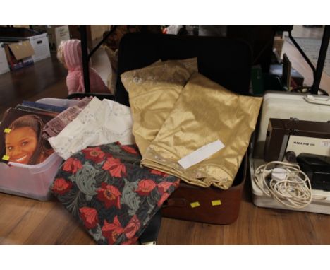 Suitcase containing four pairs of curtains