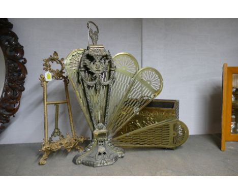 Peacock fanning style brass fire screen, magazine rack and freestanding picture or book stand 