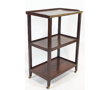 A French 19th century mahogany three shelf etagere of plain rectangular form, the top with a plain fillet edge and a pressed 