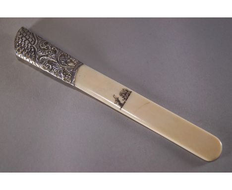 An ivory and silver mounted armorial paper flip, the silver cast with scale and acanthus pattern, hallmarked for Birmingham, 