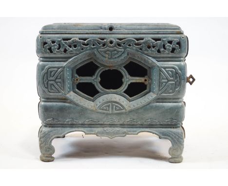A pale blue enamel rectangular section stove, moulded with Chinese style scroll and fretwork, with hinged top, 46cm high x 47