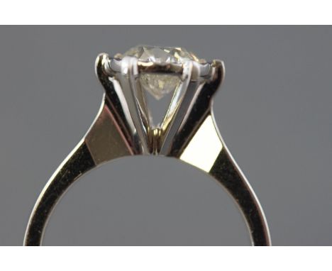 A white metal single stone ring. Illusion set with a round brilliant cut diamond measuring approximately 7.00mm diameter and 