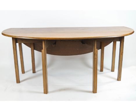 A 19th century mahogany oval wake table on square gate legs, 72.5cm high x 45cm wide x 181cm long