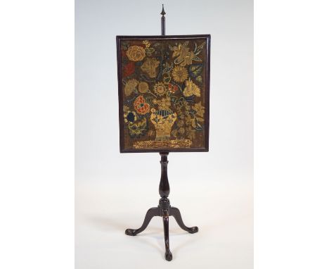 A mahogany adjustable fire pole and tapestry fire screen, on baluster stem and tripod scroll base, late 18th century, 132cm h